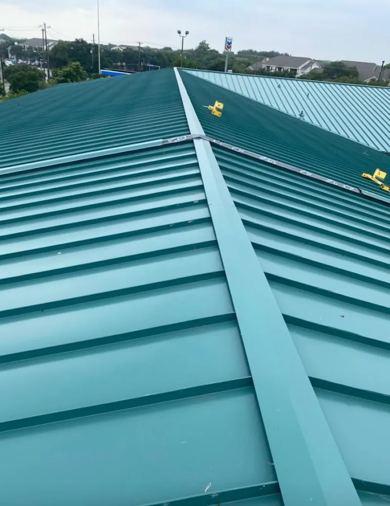 Green commercial metal roof ridge and valley for Metal Roof Repair in Mount Clemens