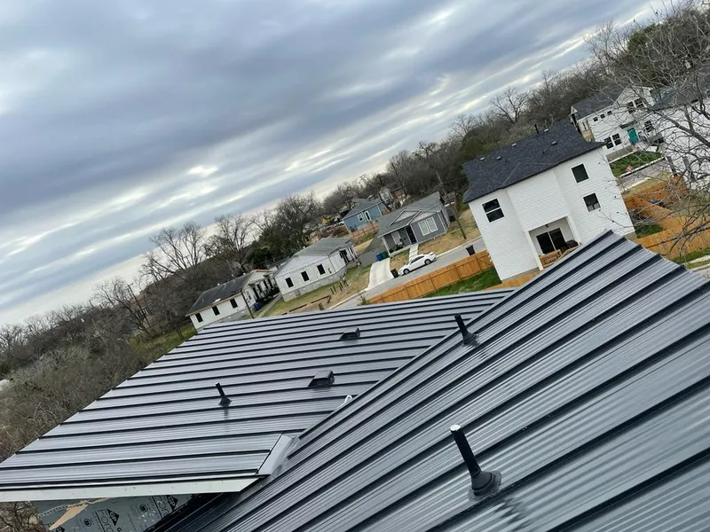 Standing seam metal roof panels with vents for Skylight Repair in Mount Clemens